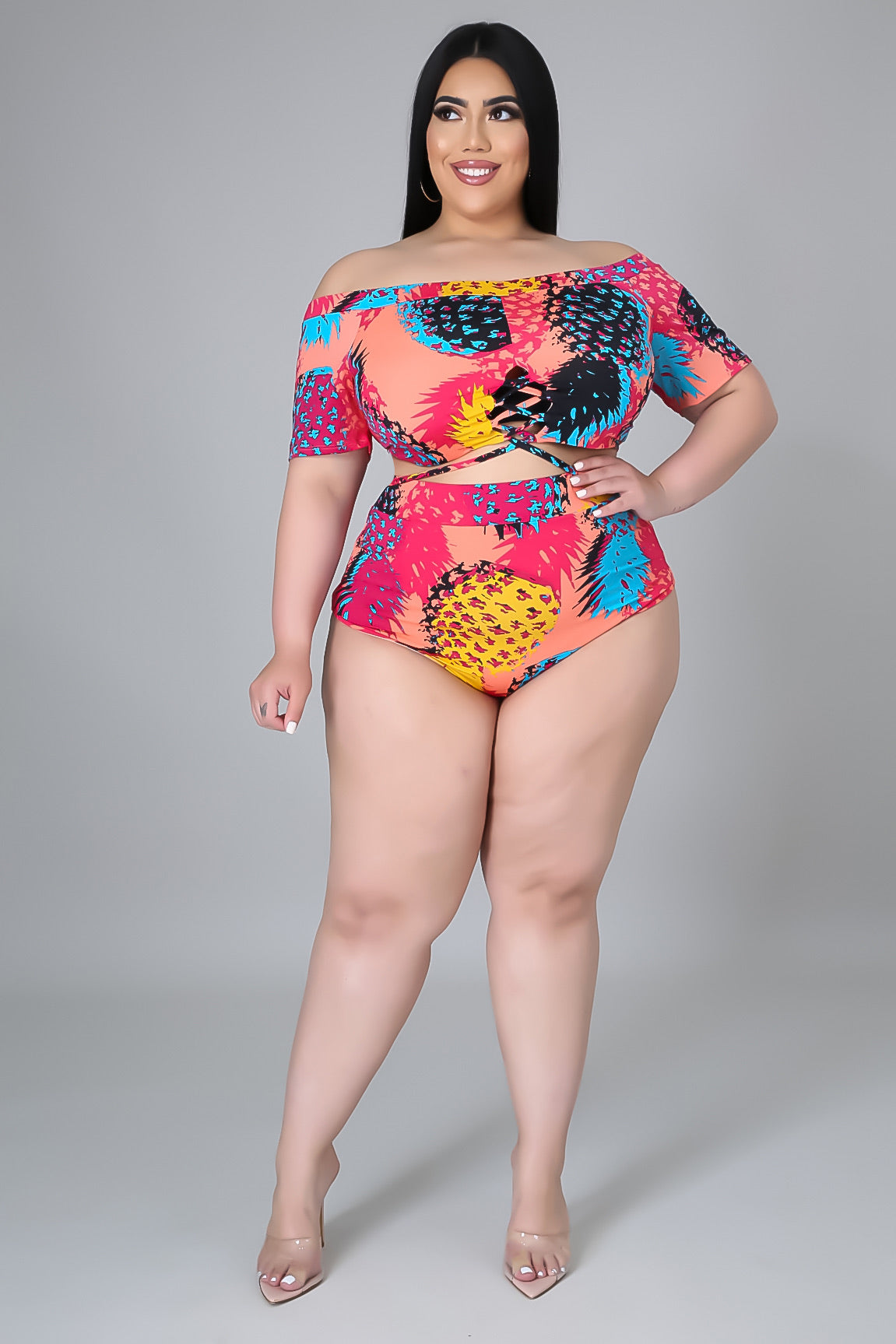 plus size boyshort swim suit two piece set. multi color throughout with subtle pineapple design 