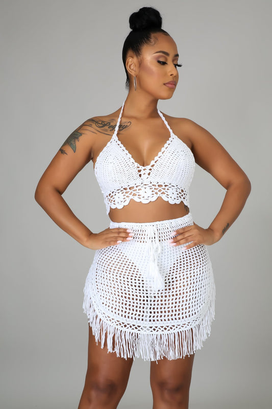 two piece cover up set in white. skirt has drawstring. set is crochet 